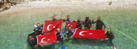  (ALKÜ) Spor Bilimleri Fakültesi öğrenciler gökyüzünde ve sualtında 15 Temmuz şehitlerini andı